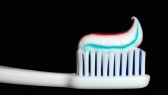 Tooth-Brush-Toothpaste-On-Black