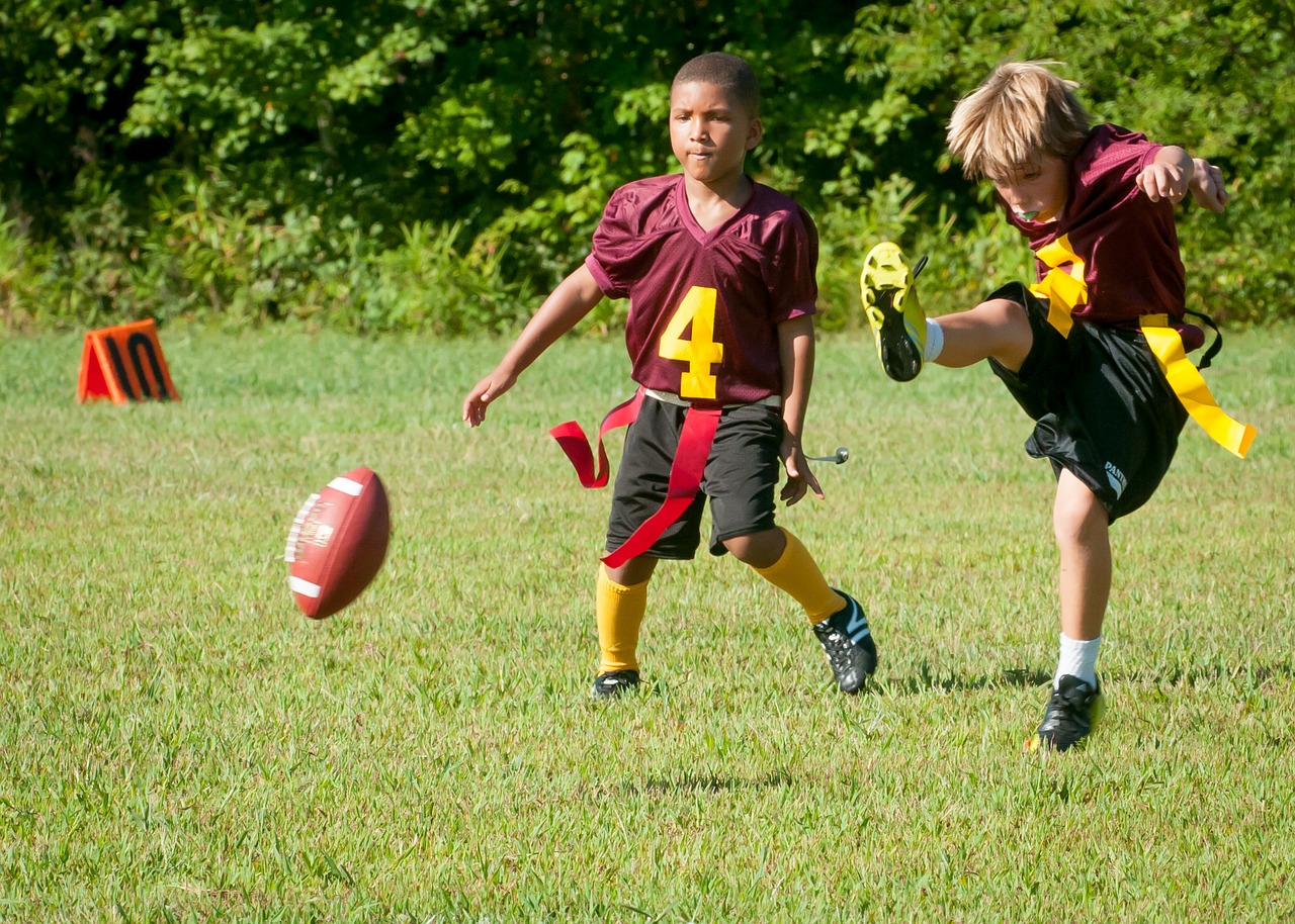 Image: Football alters young kids brains – even before concussions