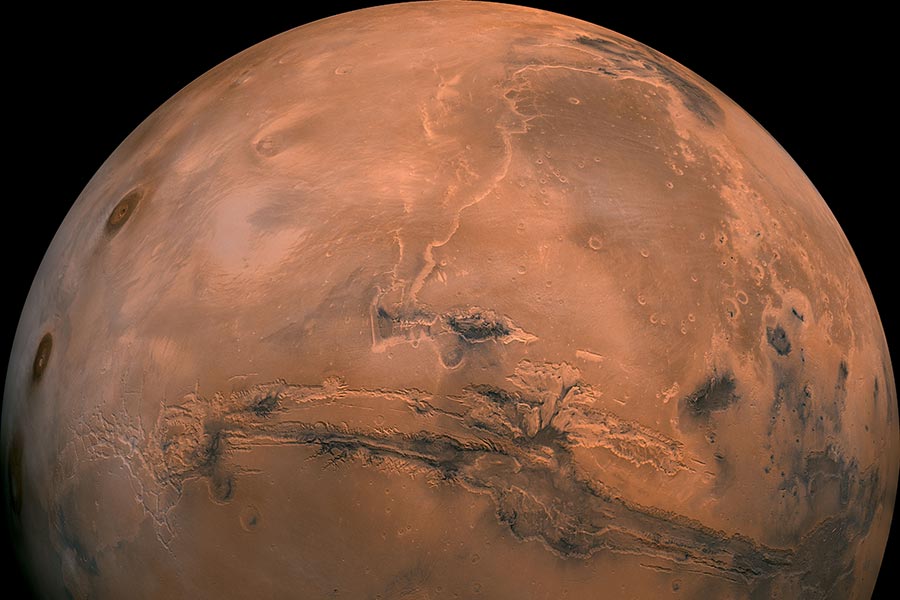 Image: Trump signs NASA funding bill, hopes to send humans to Mars