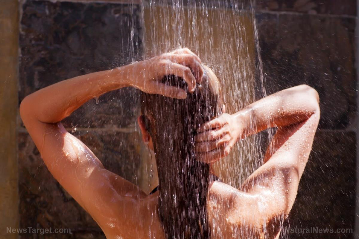 Image: Singing in the shower every morning will make you happy, experts say