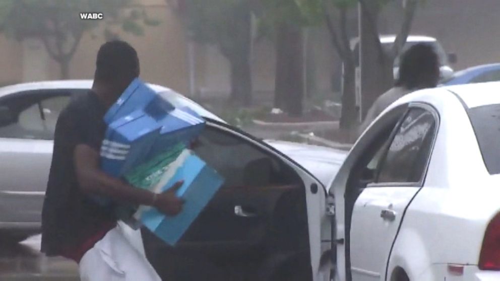 Image: In the middle of a hurricane, what do city dwellers LOOT? Sneakers, of course…