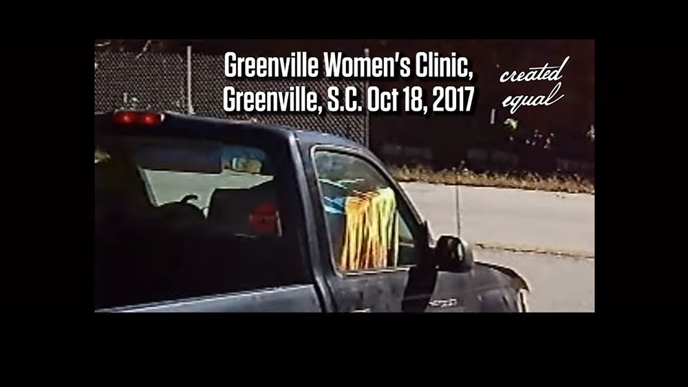 Image: Abortion clinic worker caught on video transporting dead babies in a passenger car to have them “recycled” by a waste truck