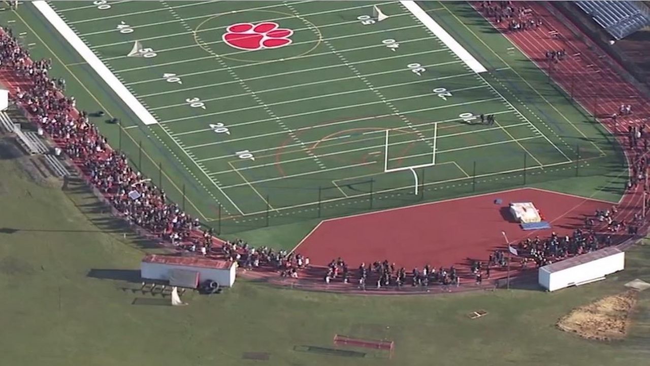 Image: New Jersey high school students WALK out in protest of teacher who was suspended because he dared say the school lacked security
