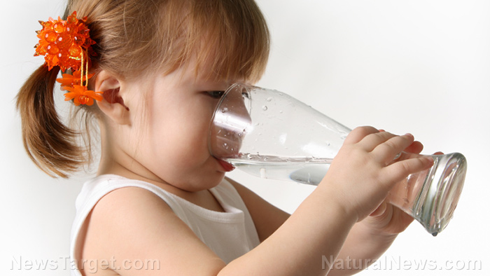 Image: Dehydrated children: Kids are drinking about one quarter of the water they should be, according to new study
