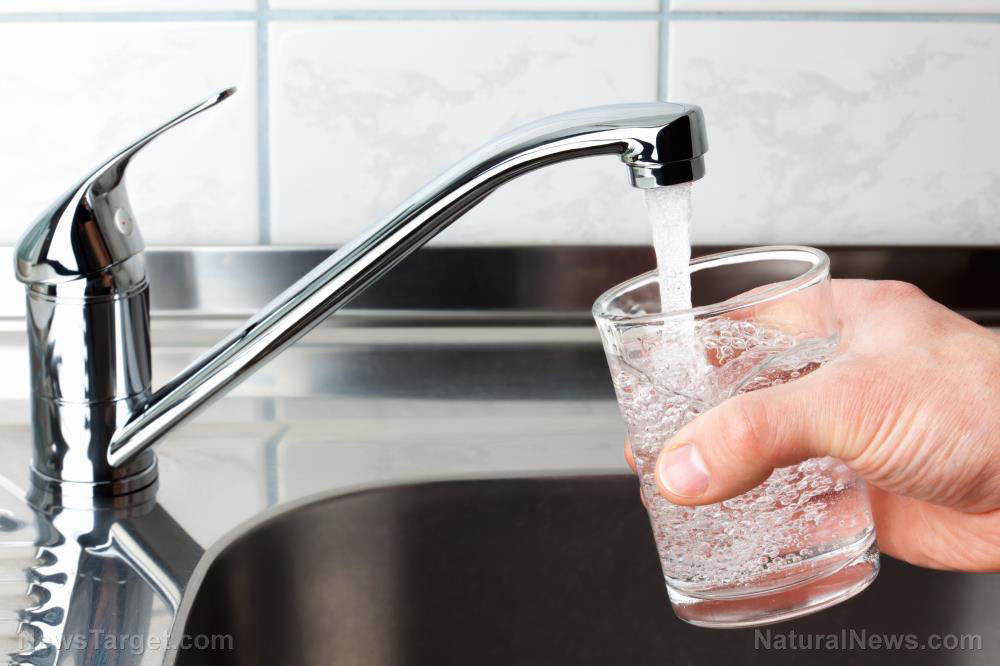 Image: Chemicals found in tap water could be responsible for more than 100,000 cases of cancer