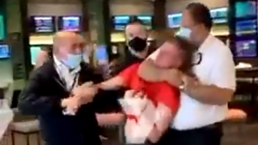 Image: Medical police state HORRORS in Australia: Young man choked out, slammed to the ground, heaved out of a restaurant for not wearing a mask