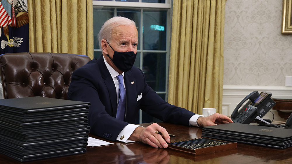 Image: Biden says Americans will have to wear face masks until 2022