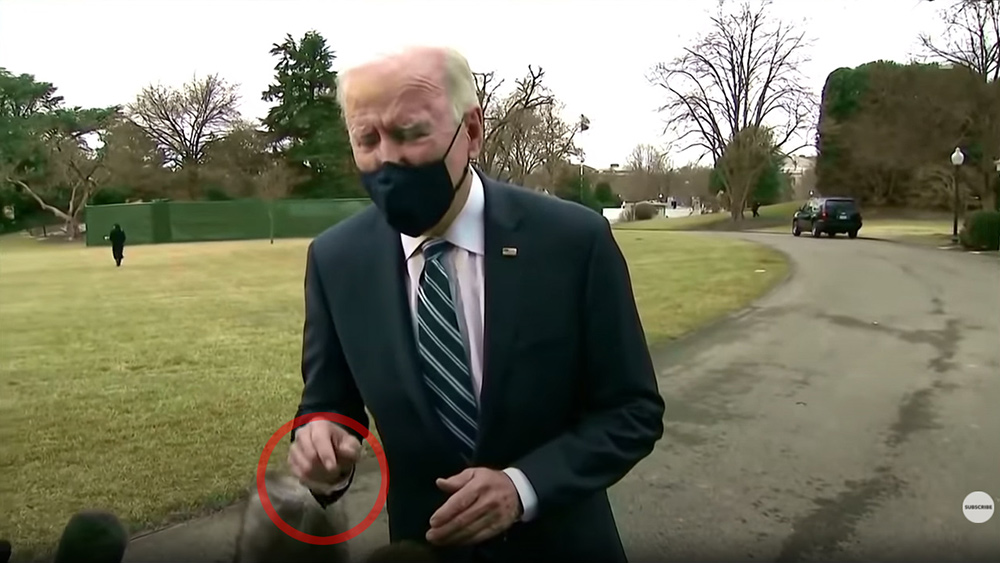 Image: FAKE CGI Biden caught moving hand through reporter’s camera gear even though his image was standing several feet away