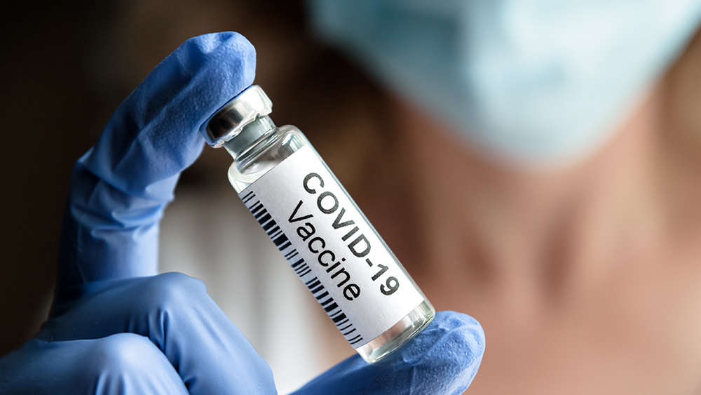 Image: German clinic stops giving employees COVID-19 booster shots after reports of adverse effects