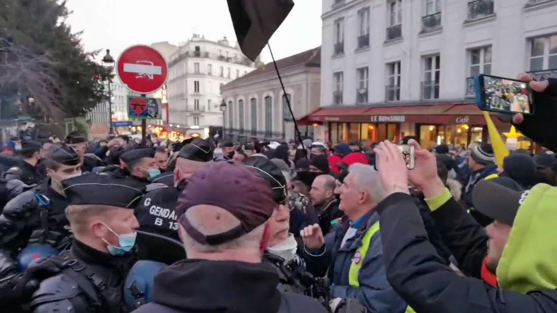 Image: Thousands take to the streets in protest of COVID-19 vaccine passports in France