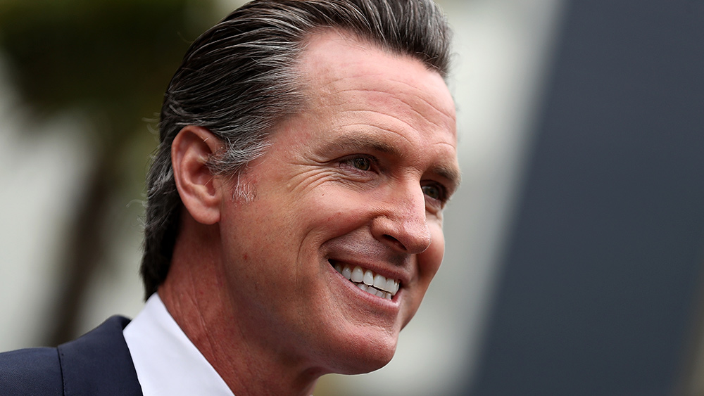 Image: Newsom signs bill requiring every registered voter be mailed a ballot