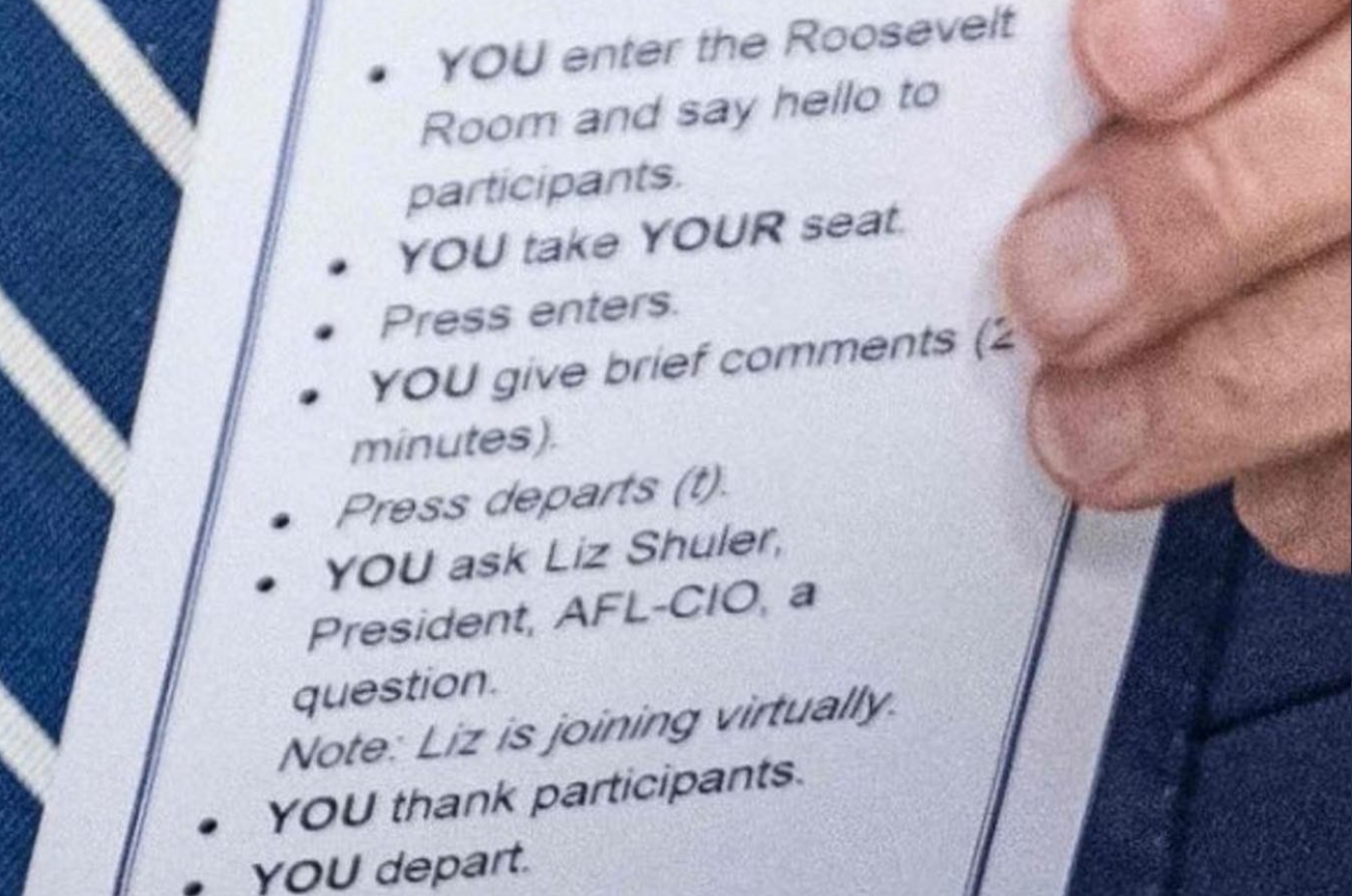 Image: Biden given ‘cheat sheet’ that instructs him how to say “hello” and sit down